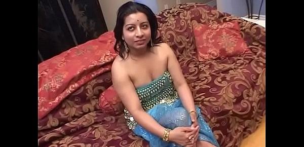  Plump Indian honey with nice boobs sucks and fucks two big dicks in bed